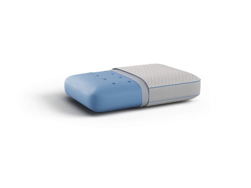 Blauw gel memory kussen met geventileerde gaten en grijze gebreide hoes.