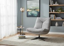 Draaifauteuil in grijs textiel met een zwart metalen kruisvoet.