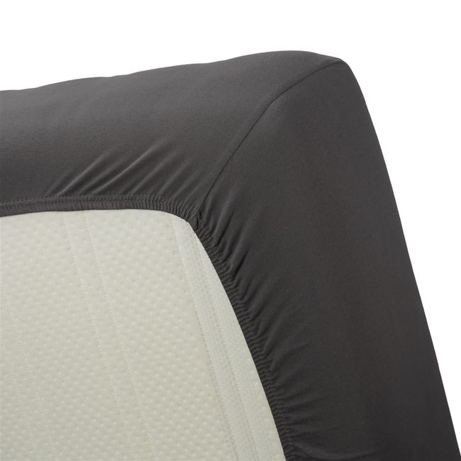 Hoeslaken jersey in donkergrijs, van 100% katoen, toont de elastische zijkant om een matras.