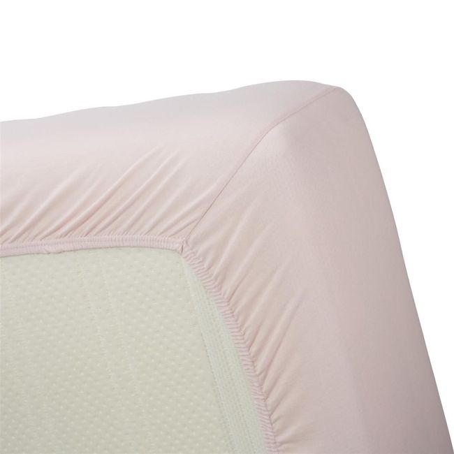 Hoeslaken roze jersey met elastiek om een matras, van katoen.