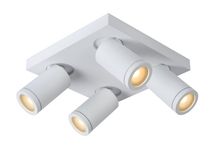 Vierkante witte plafondspot met vier verstelbare, cilindervormige lichtpunten van metaal.