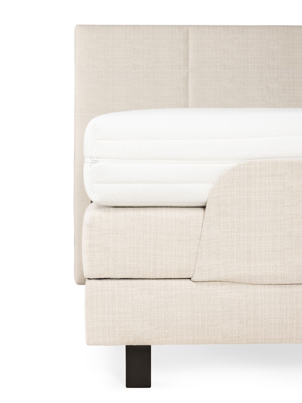 Elektrische boxspring firm BE CHILL, beige met stoffen bekleding en wit matras.
