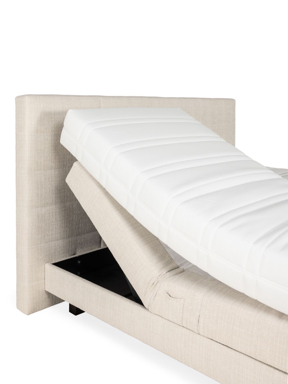 Beige elektrische boxspring met verstelbaar hoofdeinde en wit matras.