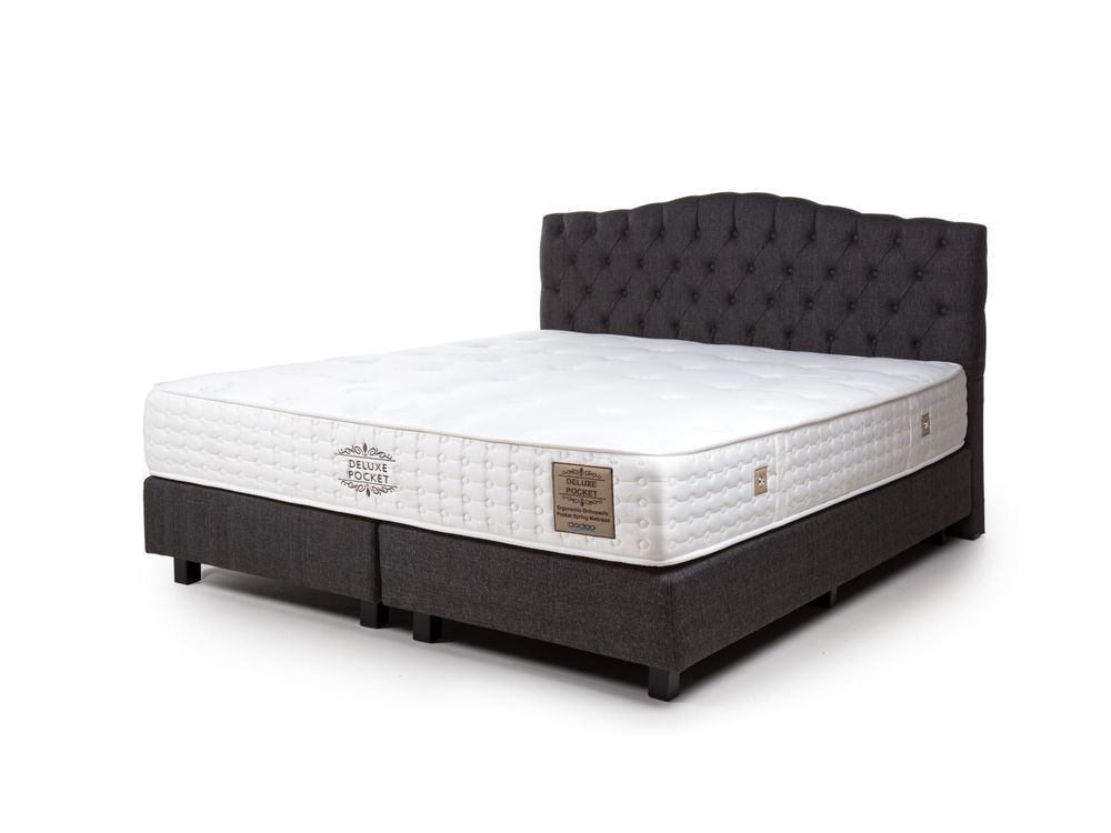 Boxspring GENT 180cm, donkergrijs met stoffen hoofdbord en wit matras.