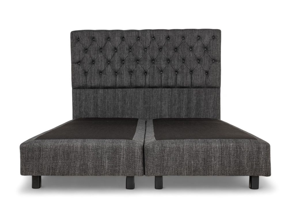 Boxspring DINANT 160 cm met gestoffeerd hoofdbord en bedbodems van donkergrijs textiel.