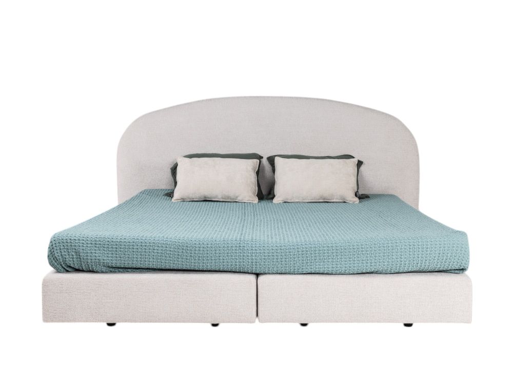 Boxspring Aspen, beige van stof met afgerond hoofdbord.