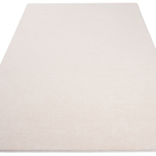 Tapijt OASIS Ecru, gemaakt van zachte bouclé wol voor een comfortabel gevoel.